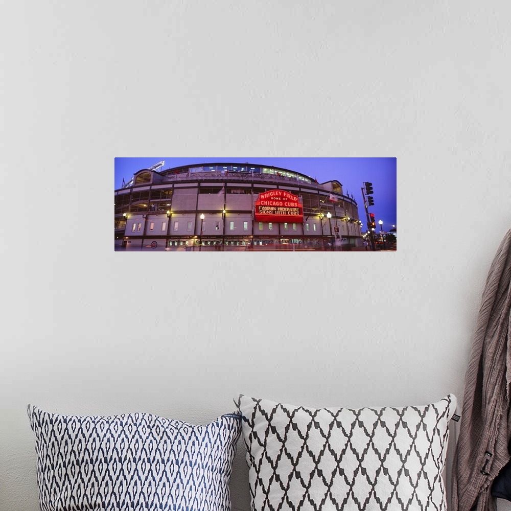 A bohemian room featuring Panoramic photograph of the outer walls and sign of Wrigley Field where the Chicago Cubs play bas...