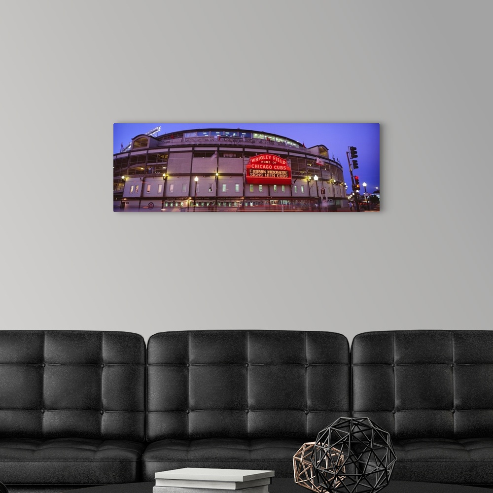 A modern room featuring Panoramic photograph of the outer walls and sign of Wrigley Field where the Chicago Cubs play bas...