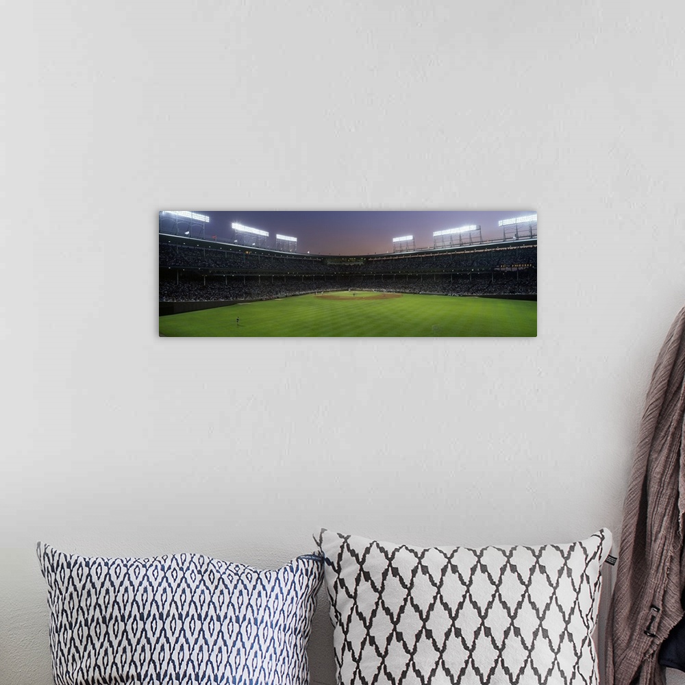 A bohemian room featuring Panoramic view the crowd and field at Wrigley field in Chicago, Illinois.