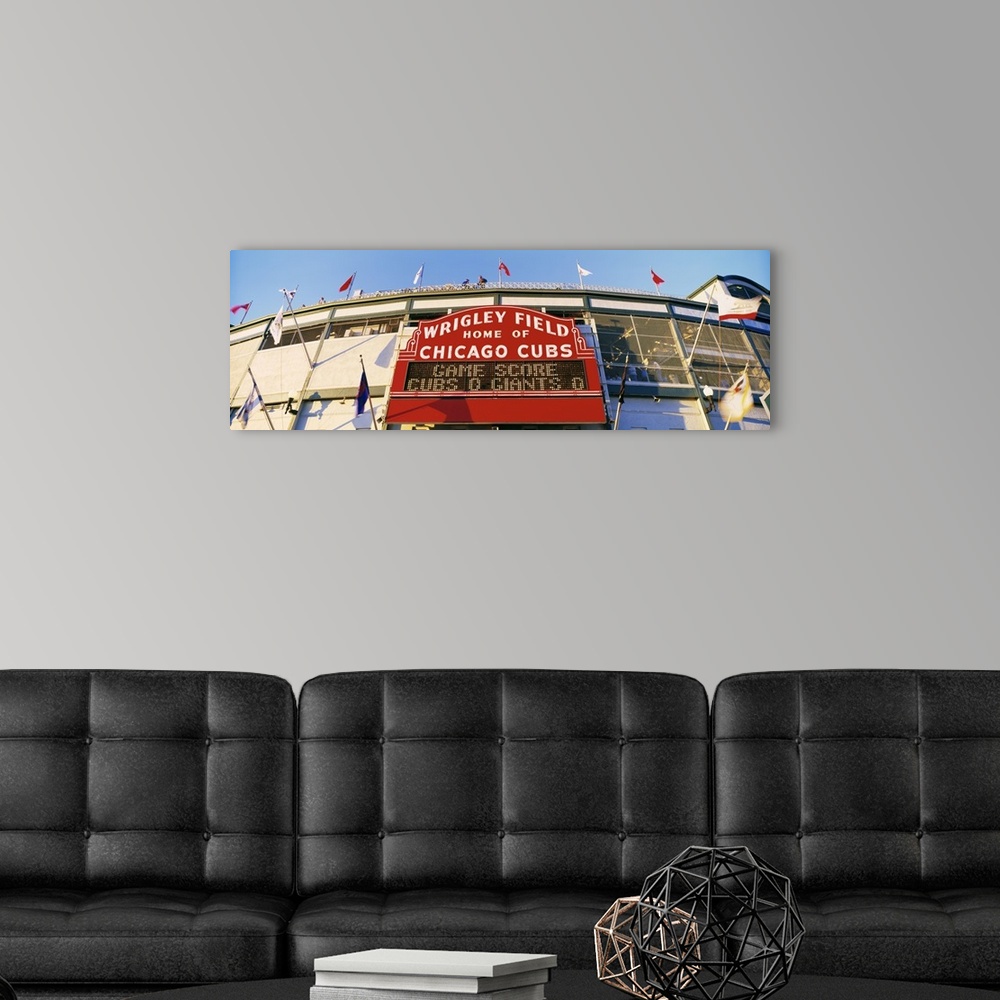 A modern room featuring Panoramic photograph of Chicago Bears baseball stadium entrance.