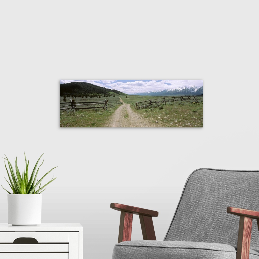 A modern room featuring Wyoming, Grand Teton National Park, Dirt road in a landscape
