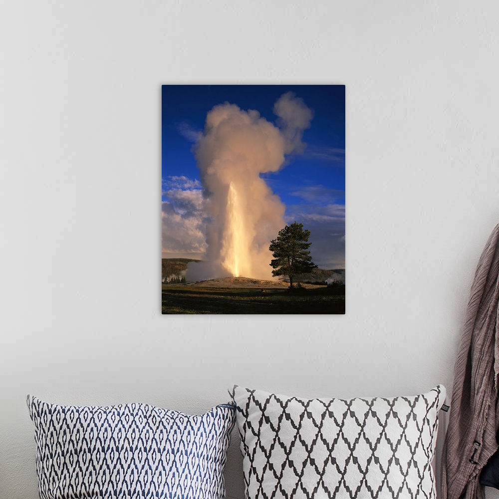 A bohemian room featuring Wyoming, Yellowstone National Park, Old Faithful, Steam and water erupting from thermal pool