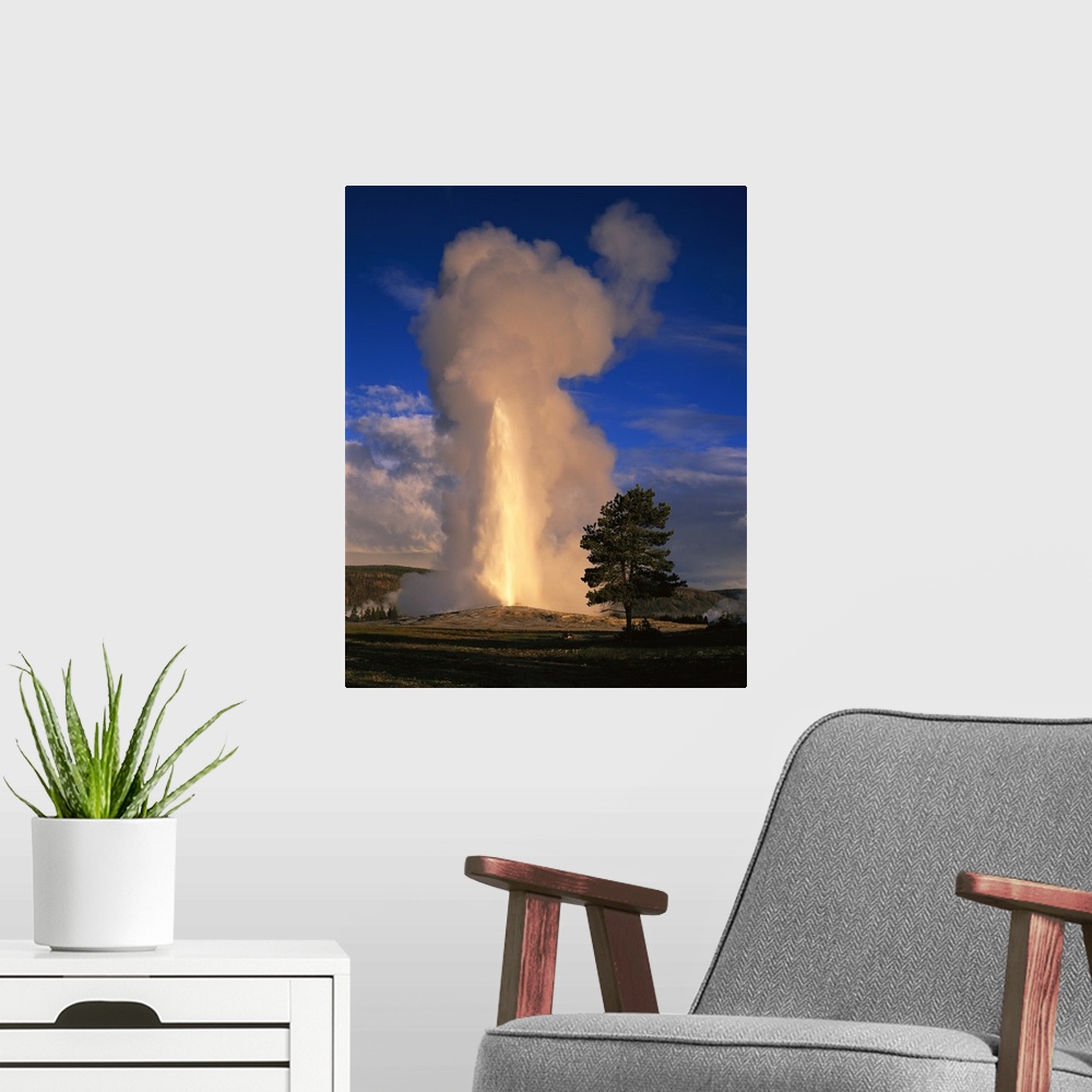 A modern room featuring Wyoming, Yellowstone National Park, Old Faithful, Steam and water erupting from thermal pool
