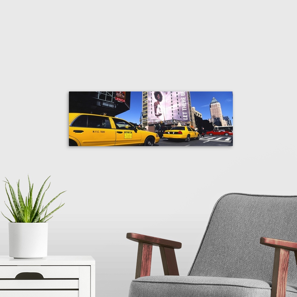 A modern room featuring Yellow taxies at the road intersection, Manhattan, New York City, New York State