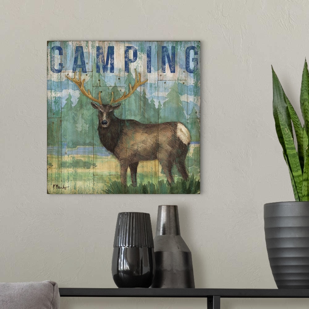 A modern room featuring Square cabin decor with a moose and wilderness painted on a faux wood background with "Camping" w...