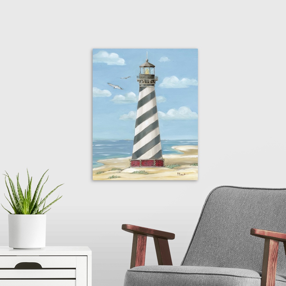 A modern room featuring Painting of the striped Cape Hatteras lighthouse on the Outer Banks with a few seagulls.