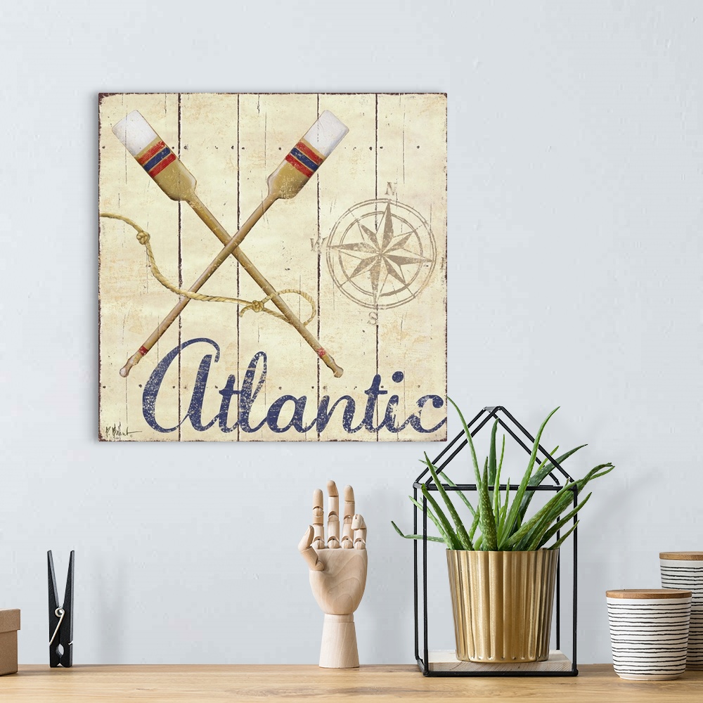 A bohemian room featuring Painted nautical sign on wood panels with a compass rose, oars, and the word Atlantic.