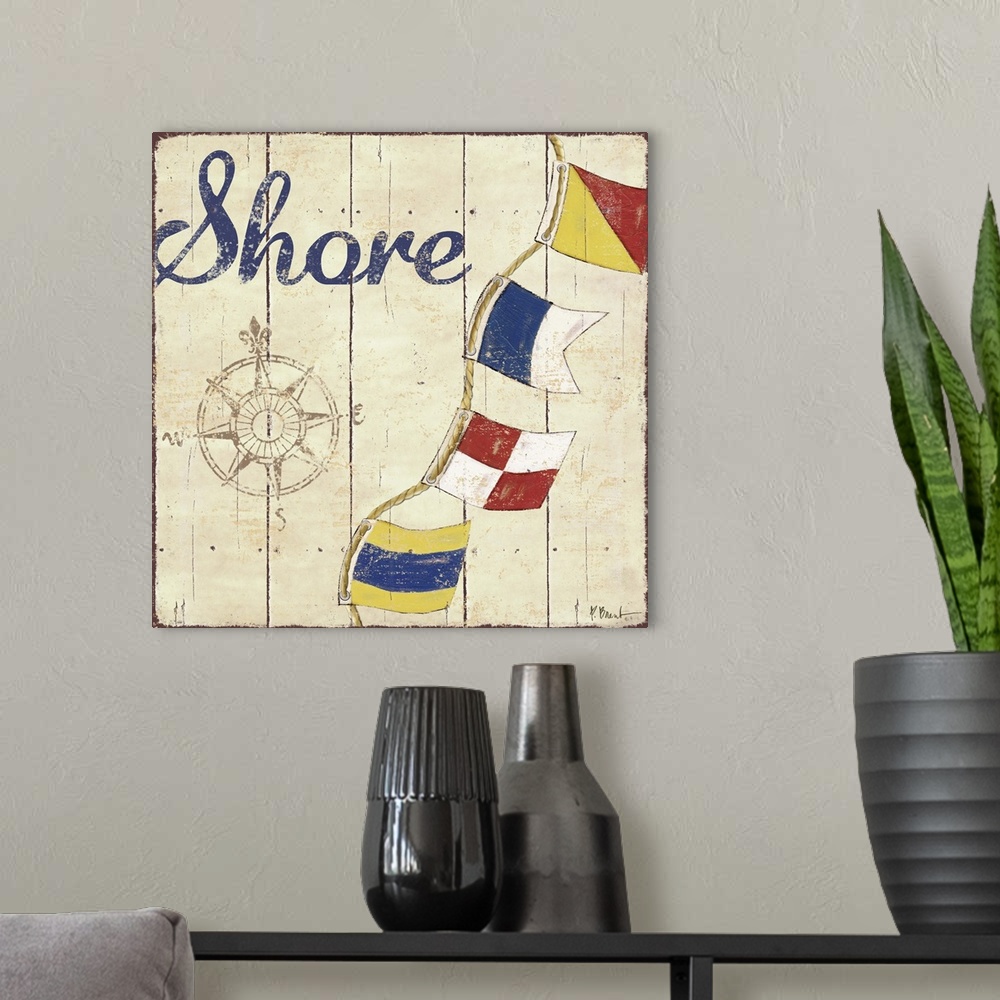 A modern room featuring Painted nautical sign on wood panels with a compass rose, flags, and the word Shore.