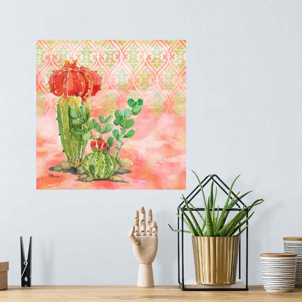 A bohemian room featuring Square watercolor painting of cacti on a light coral and green patterned background.