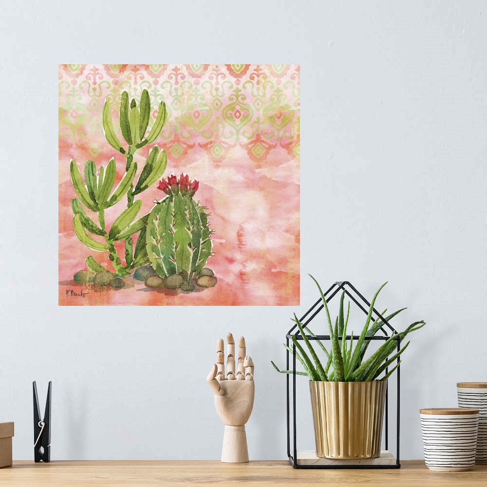 A bohemian room featuring Square watercolor painting of cacti on a light coral and green patterned background.