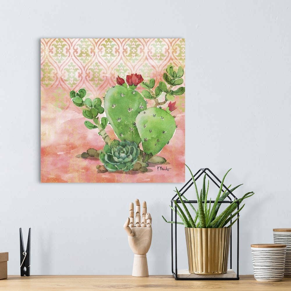 A bohemian room featuring Square watercolor painting of cacti and a succulent on a light coral and green patterned background.