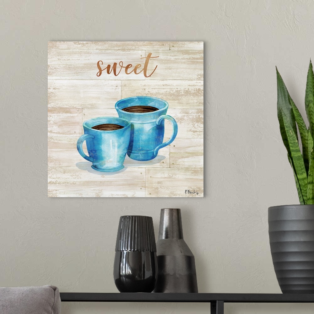 A modern room featuring Square decor with two mugs of coffee on a faux wood background with "sweet" written at the top.