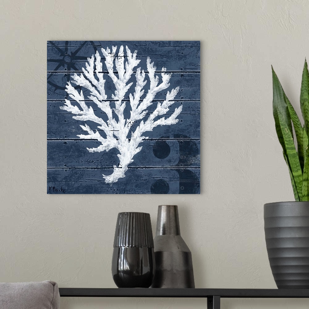 A modern room featuring Contemporary decorative artwork of a coral illustration on a dark, nautical background.