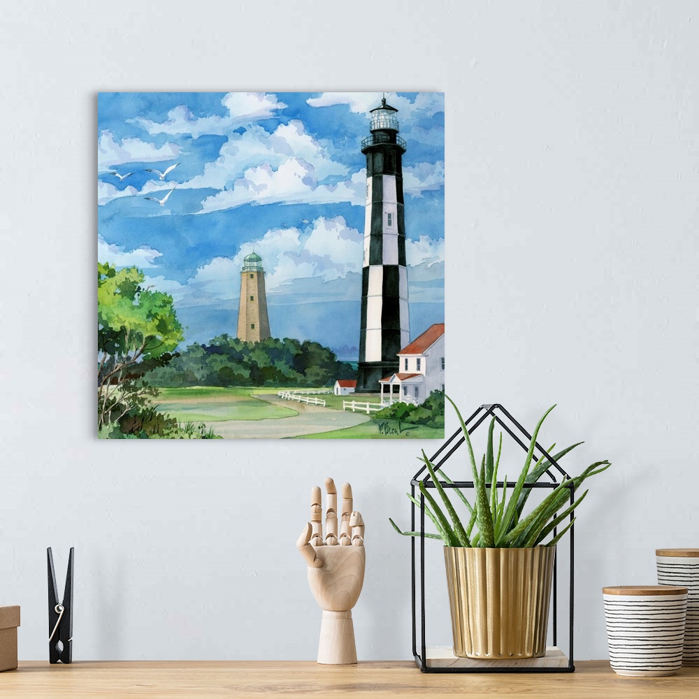 A bohemian room featuring Watercolor painting of a black and white striped lighthouse in Virginia.