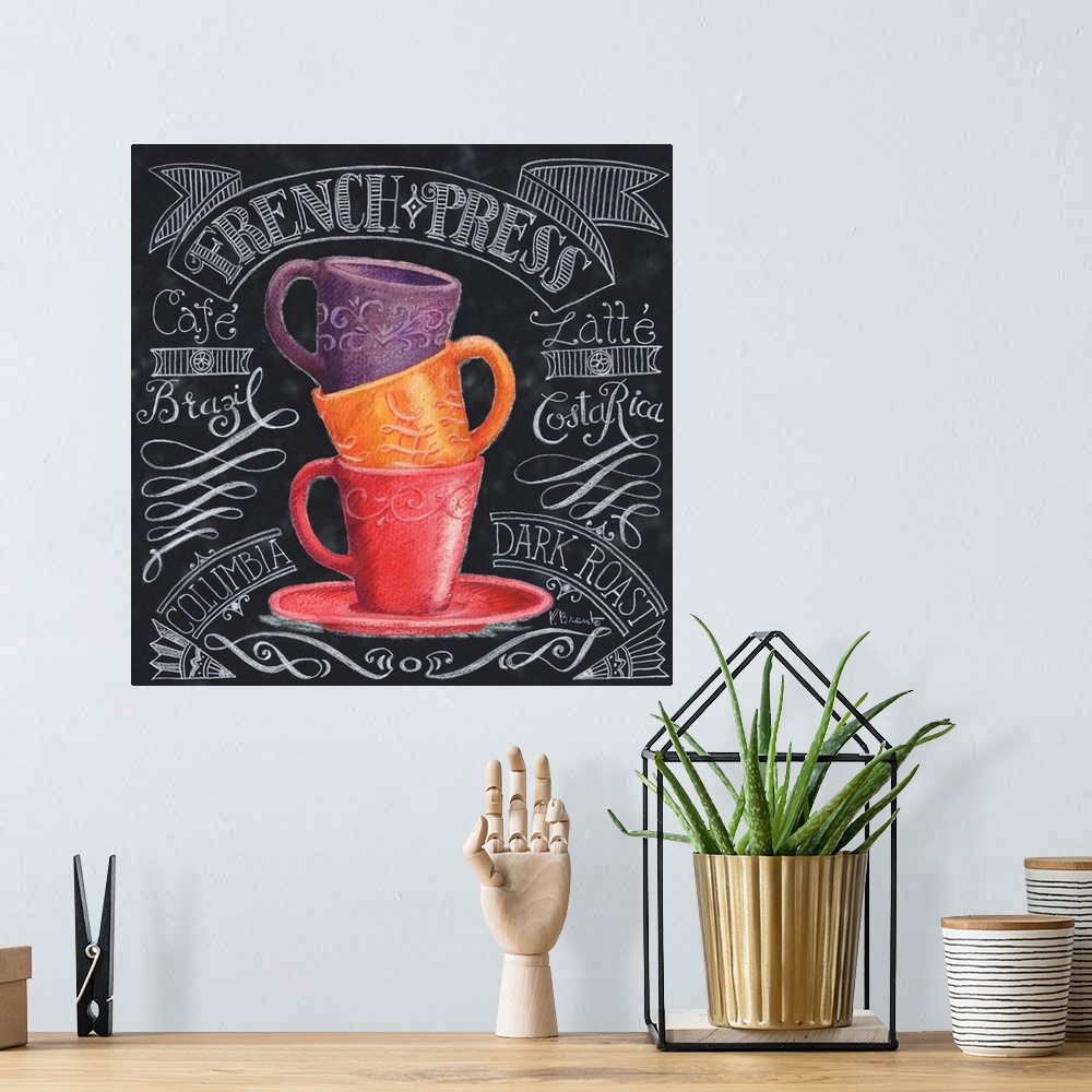 A bohemian room featuring Three coffee cups in a stack on a chalkboard style panel decorated with handwritten coffee-themed...