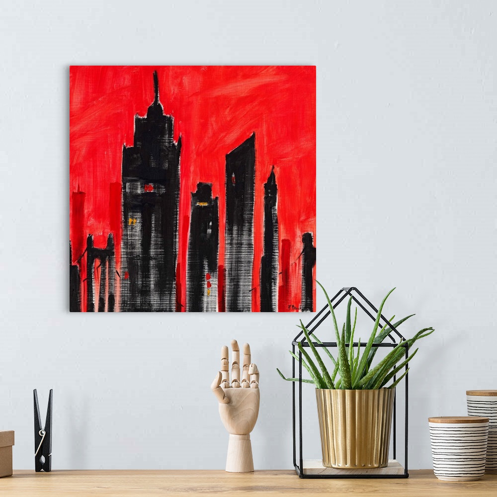 A bohemian room featuring Semi-abstract painting of silhouetted skyscrapers against a brightly colored sky.