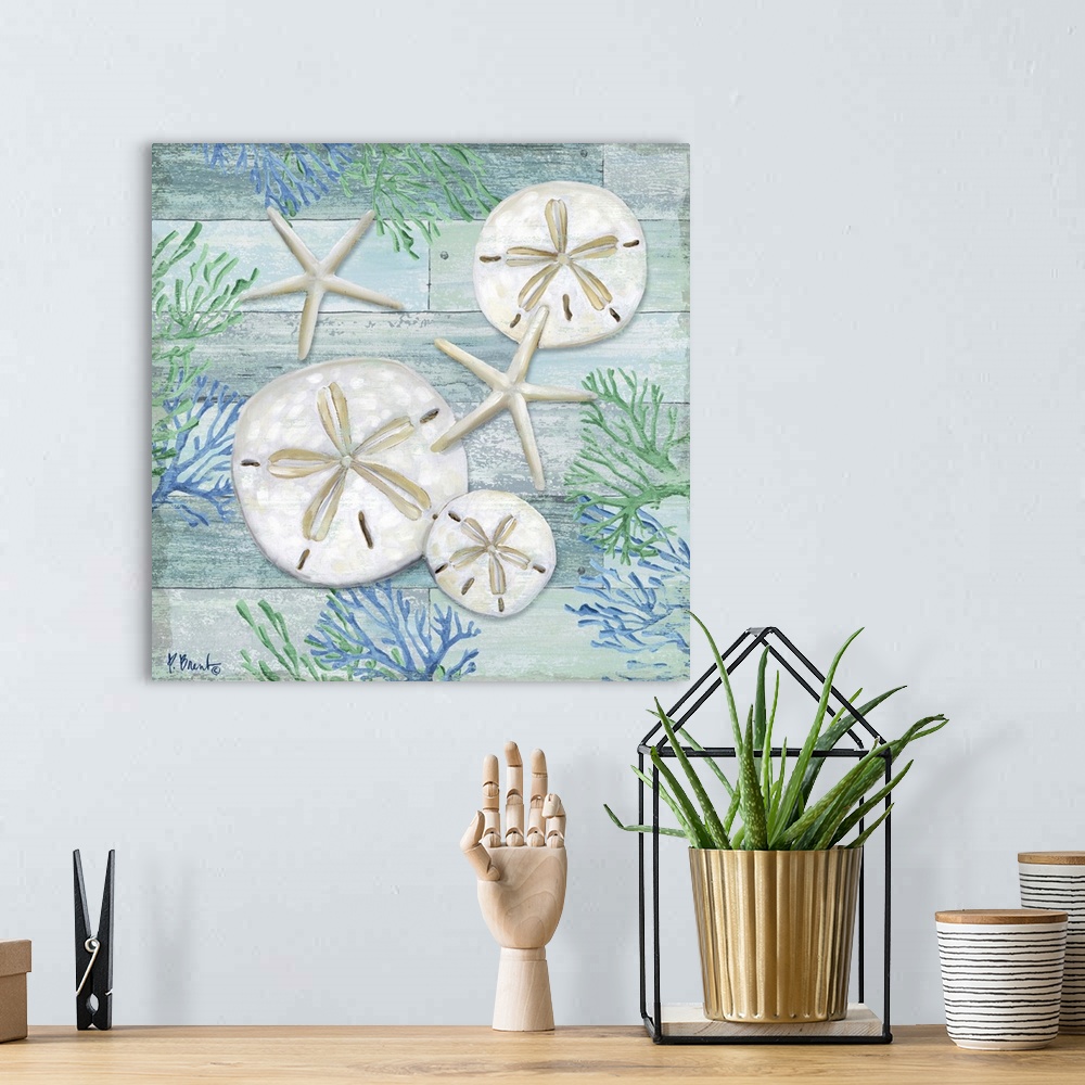 A bohemian room featuring Square sand dollar, starfish and coral decor in light blue, green, and white.
