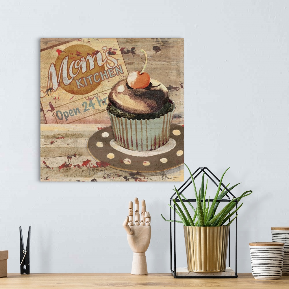 A bohemian room featuring Rustic sign for a bakery featuring a cupcake and the text Mom's Kitchen.