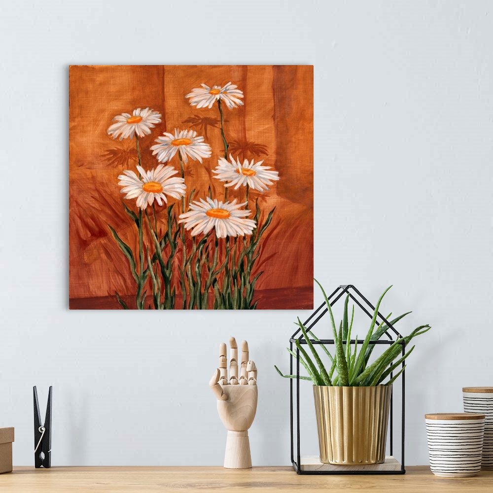 A bohemian room featuring Contemporary painting of a group of daisy flowers.