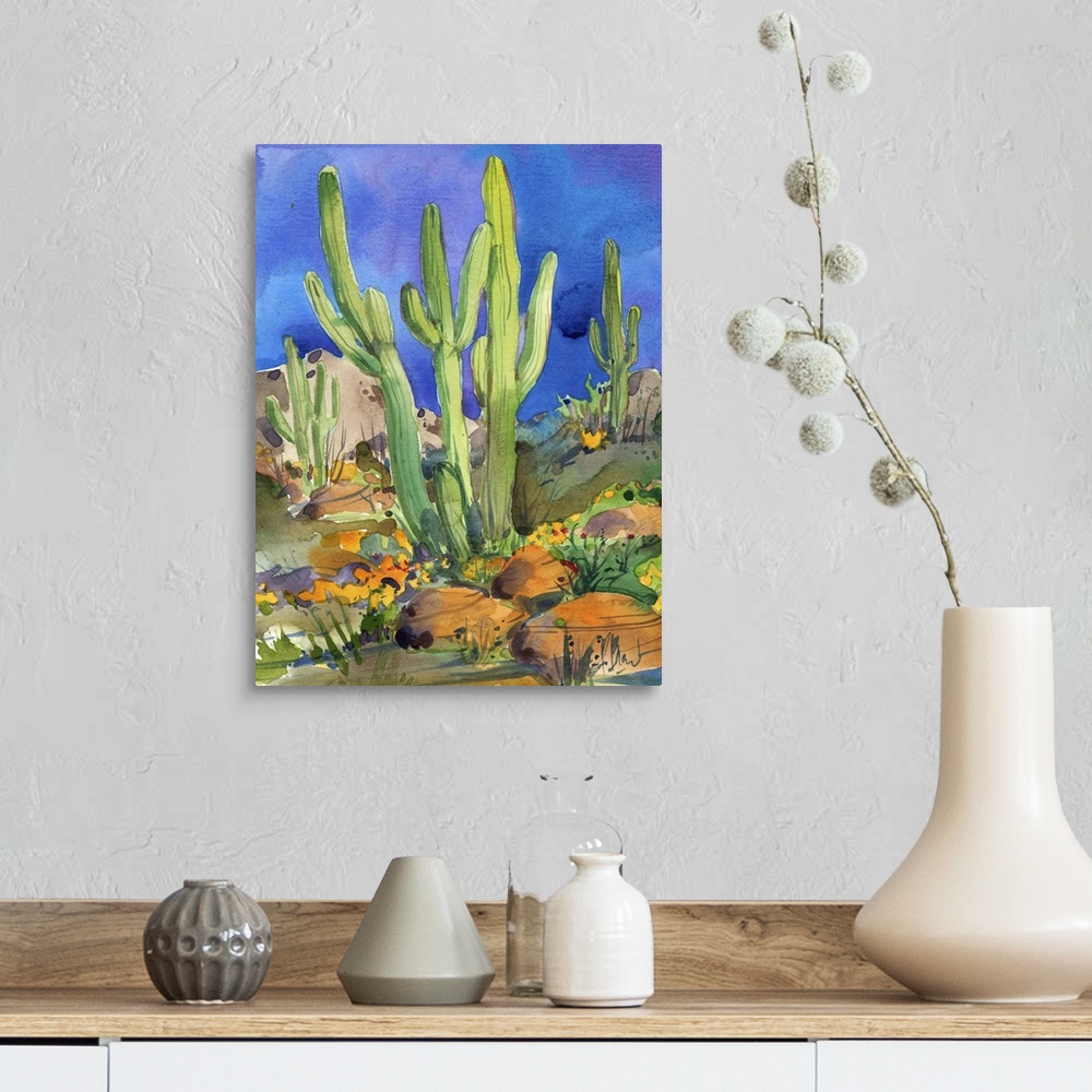 A farmhouse room featuring Watercolor painting of saguaro cacti in a rocky desert.