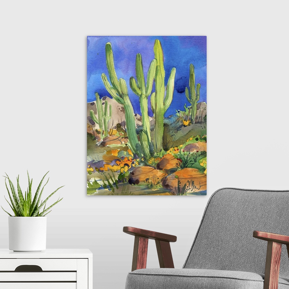 A modern room featuring Watercolor painting of saguaro cacti in a rocky desert.