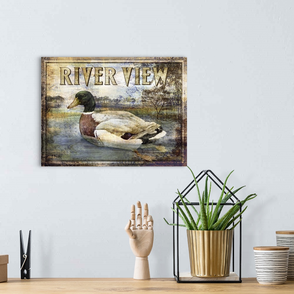 A bohemian room featuring Textured sign with a mallard duck drake in a river with the text River View.