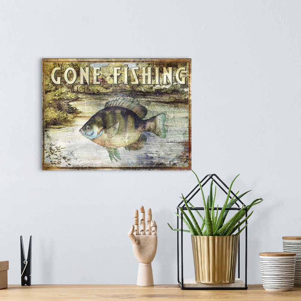 A bohemian room featuring Rustic fishing sign featuring a bluegill with the text Gone Fishing.