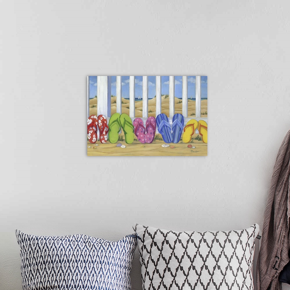 A bohemian room featuring Colorful painting of five pairs of flip flop sandals lined up in the sand against a white fence.