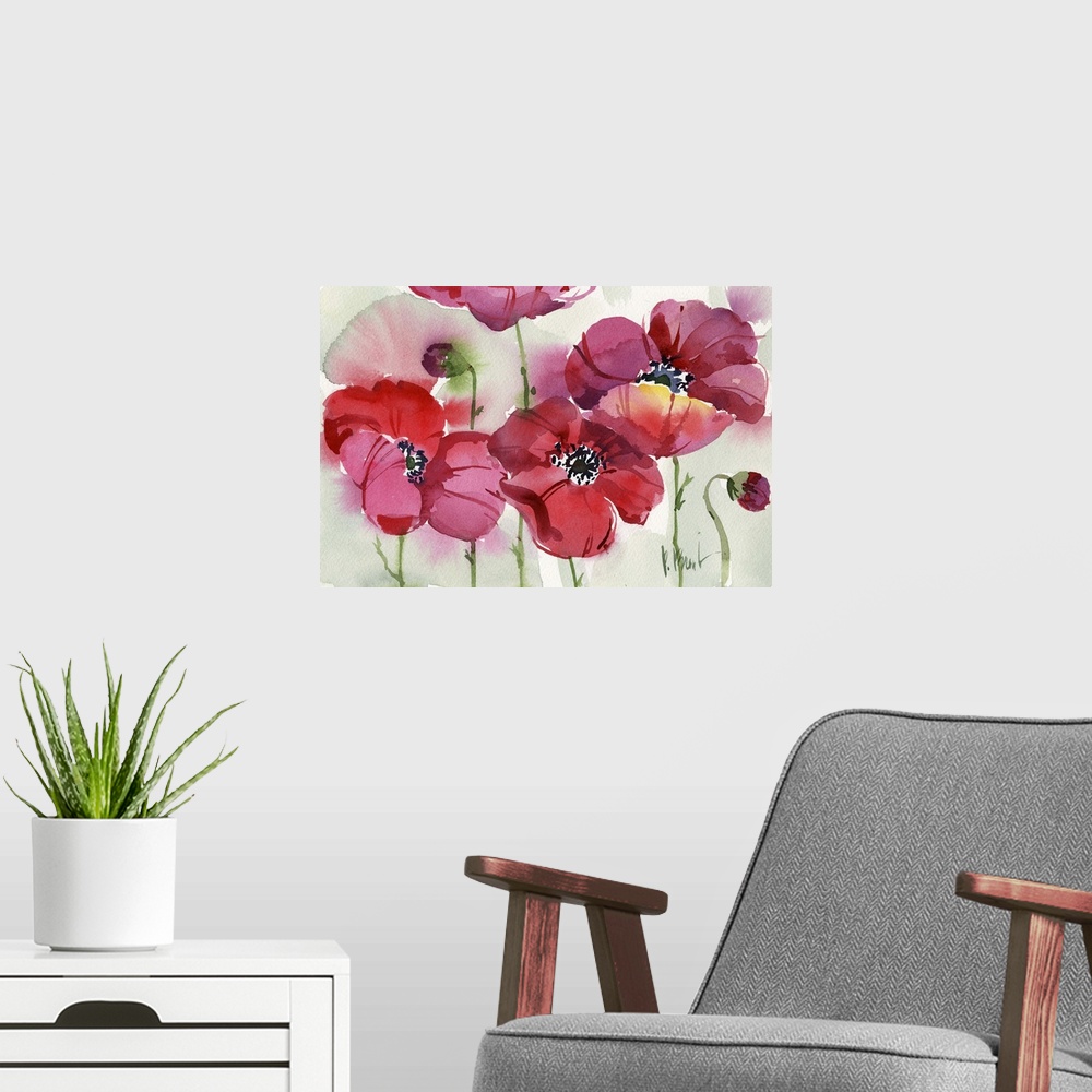 A modern room featuring Watercolor painting of a group of brightly colored poppies.