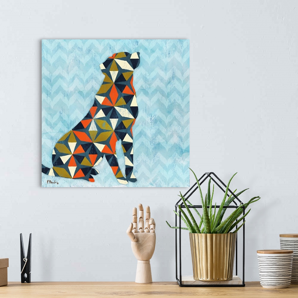 A bohemian room featuring Square decor with a silhouetted dog made with geometric shapes on a blue patterned background.