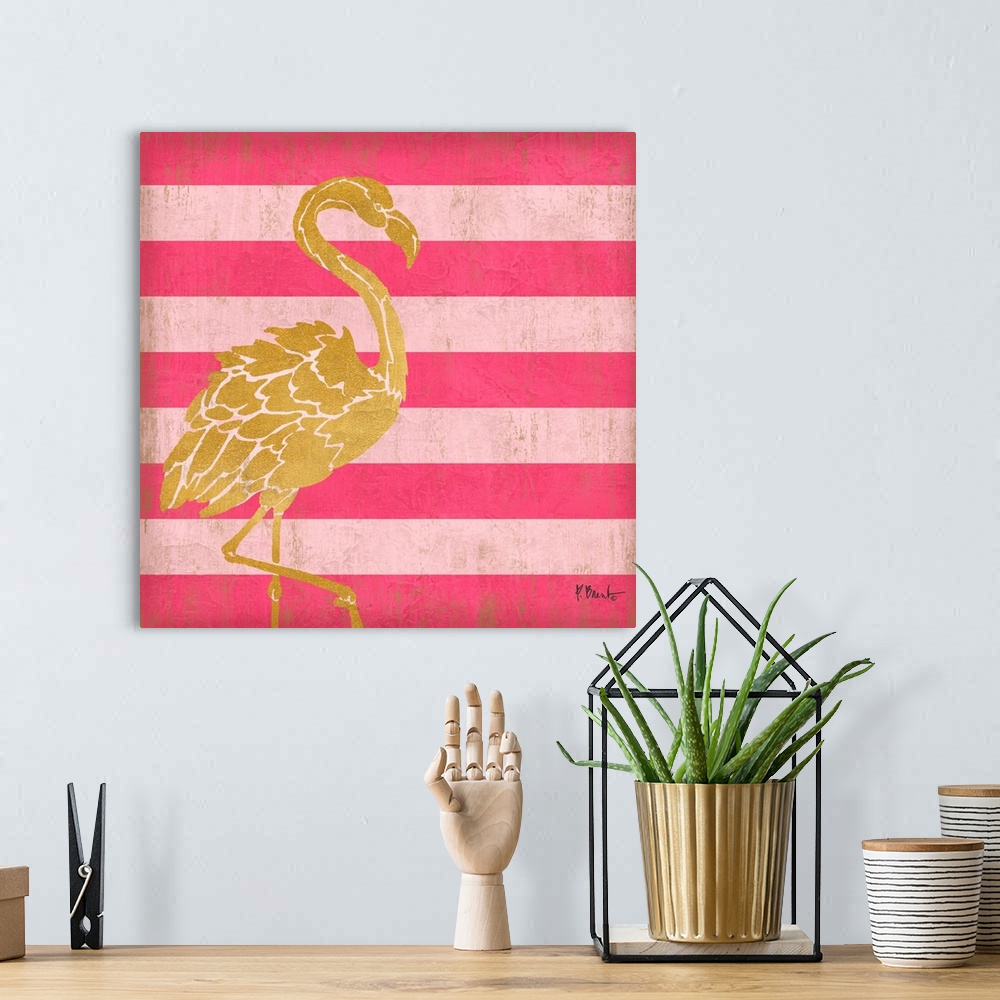 A bohemian room featuring Square decor with a metallic gold flamingo on a pink striped background.