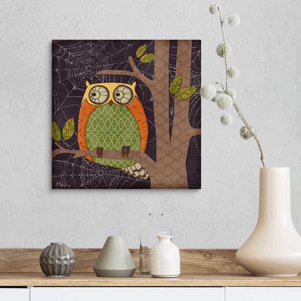A farmhouse room featuring Halloween-themed illustration of a cute owl sitting in a tree, made of patterned shapes.
