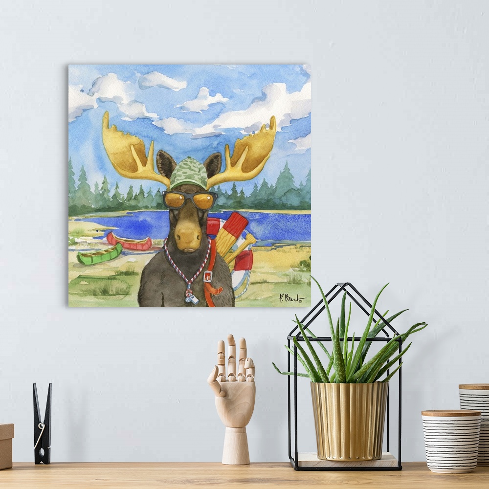 A bohemian room featuring Square watercolor painting of a moose with paddling gear outside in the wilderness.