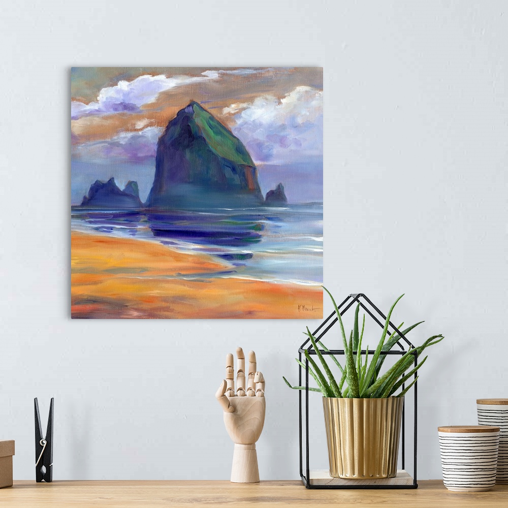 A bohemian room featuring Landscape painting of the tall rock landmarks on the Oregon coast.
