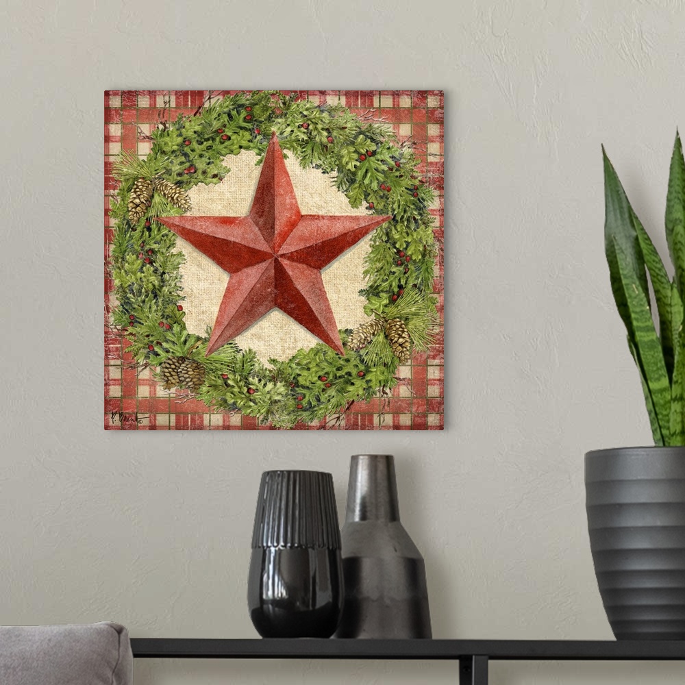 A modern room featuring A red holiday star inside a seasonal wreath.