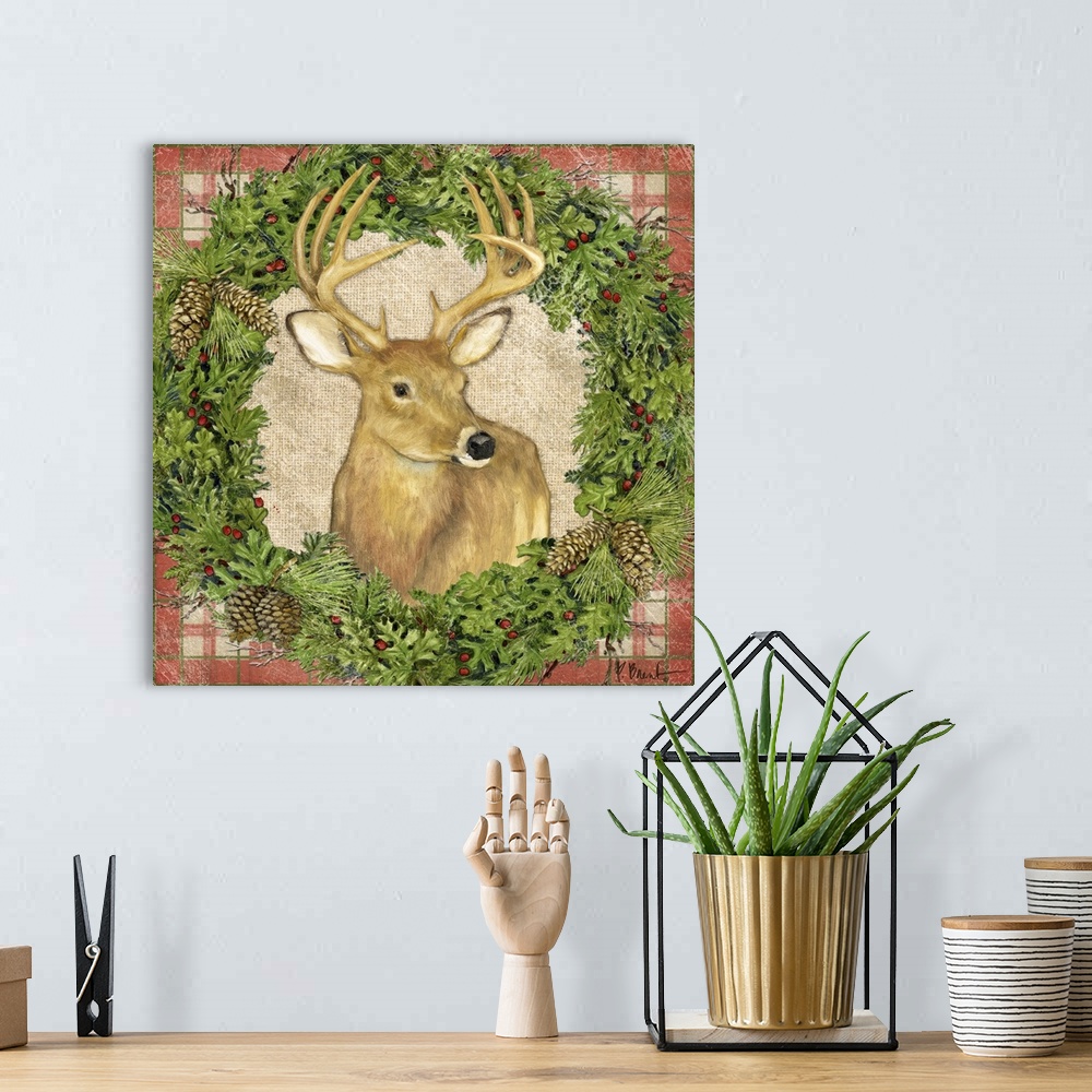 A bohemian room featuring Portrait of a deer inside a seasonal wreath.