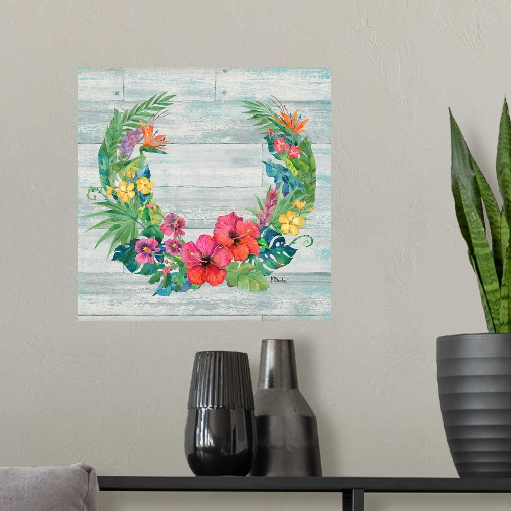 A modern room featuring Square decor with a wreath made of tropical flowers and leaves on a faux wood background.
