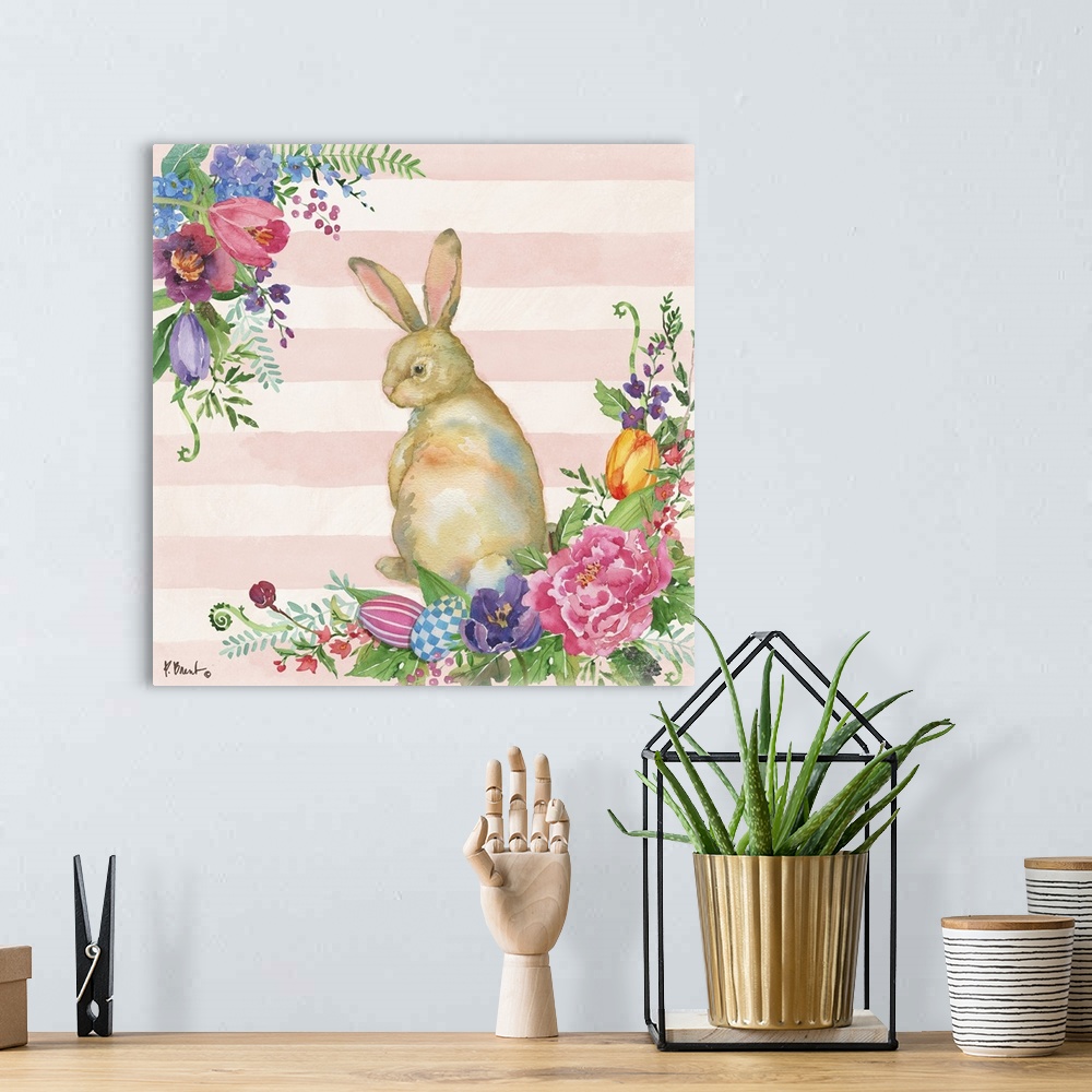 A bohemian room featuring Spring decor with a watercolor painted bunny surrounded by Spring flowers and Easter eggs on a li...