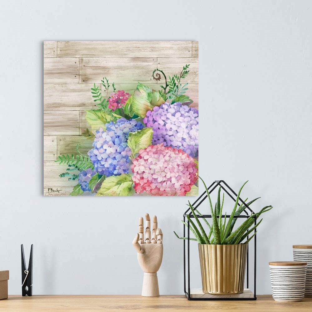 A bohemian room featuring Square decor with watercolor painted hydrangeas on a faux wood plank background.
