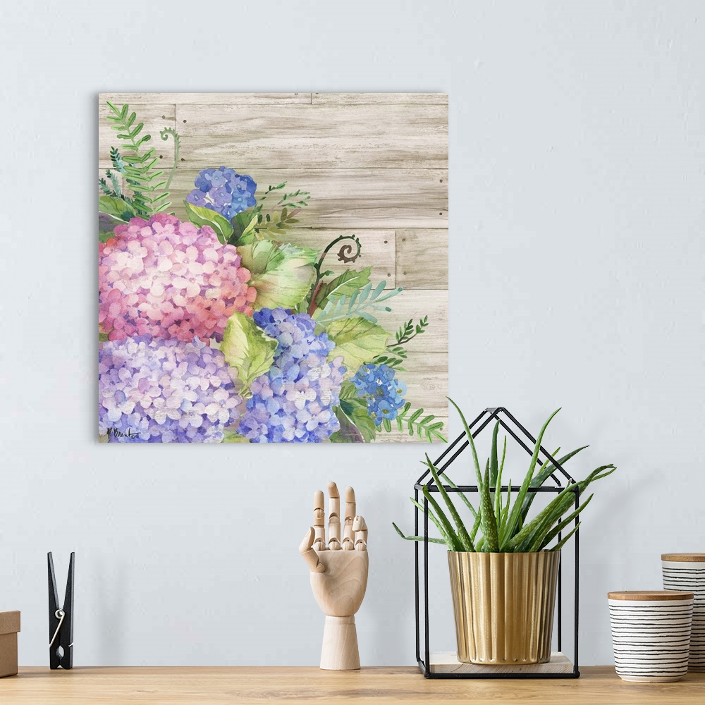 A bohemian room featuring Square decor with watercolor painted hydrangeas on a faux wood plank background.