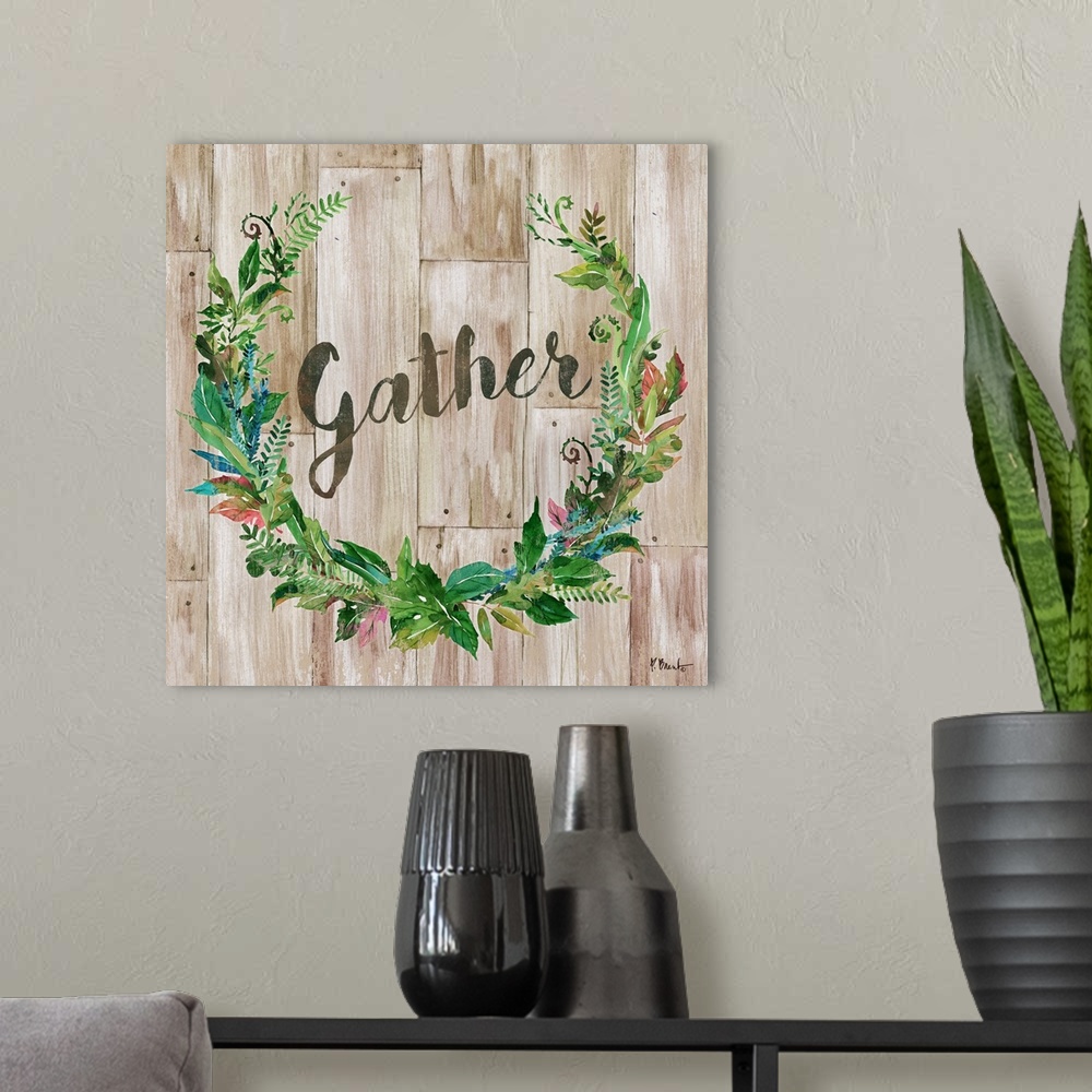 A modern room featuring "gather" written inside a leafy green wreath on a faux wood background.