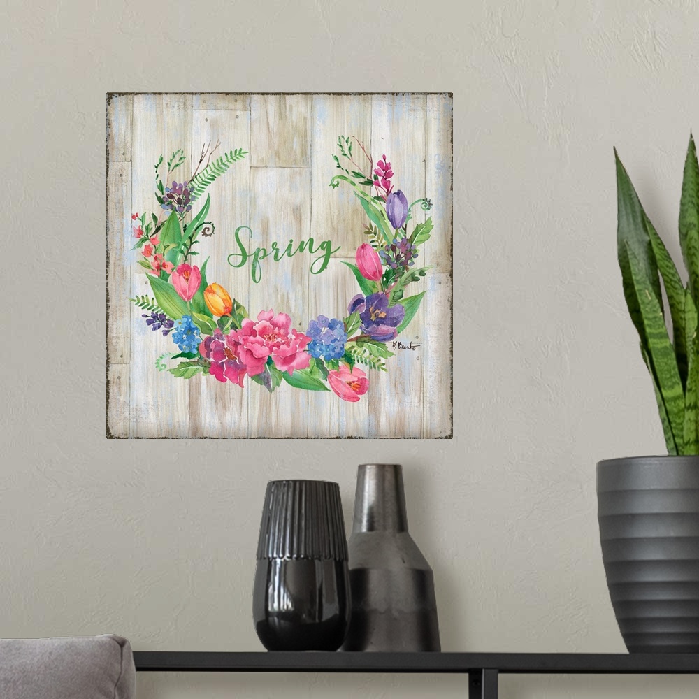 A modern room featuring Square decor with a wreath made of Spring flowers and greens on a faux wood background with "Spri...