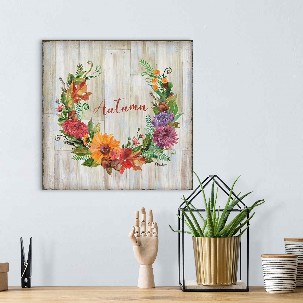 A bohemian room featuring Square decor with a wreath made of Autumn flowers and greens on a faux wood background with "Autu...