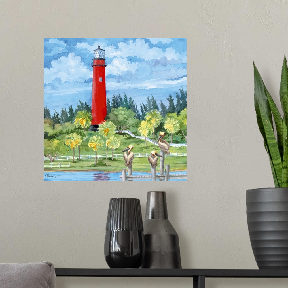 A modern room featuring Watercolor painting of a bright red lighthouse overlooking three pelicans perched on a pier.