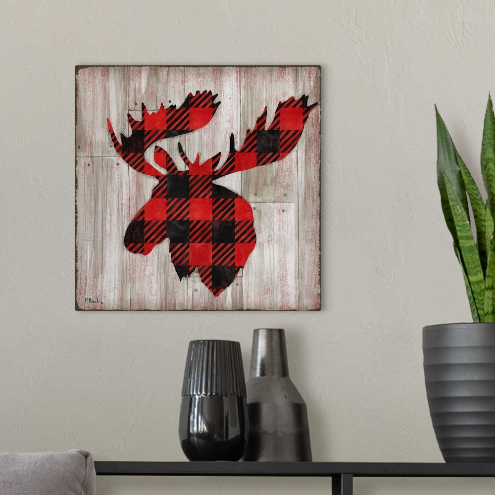 A modern room featuring Square cabin decor with a red and black flannel patterned silhouette of a moose on a faux distres...