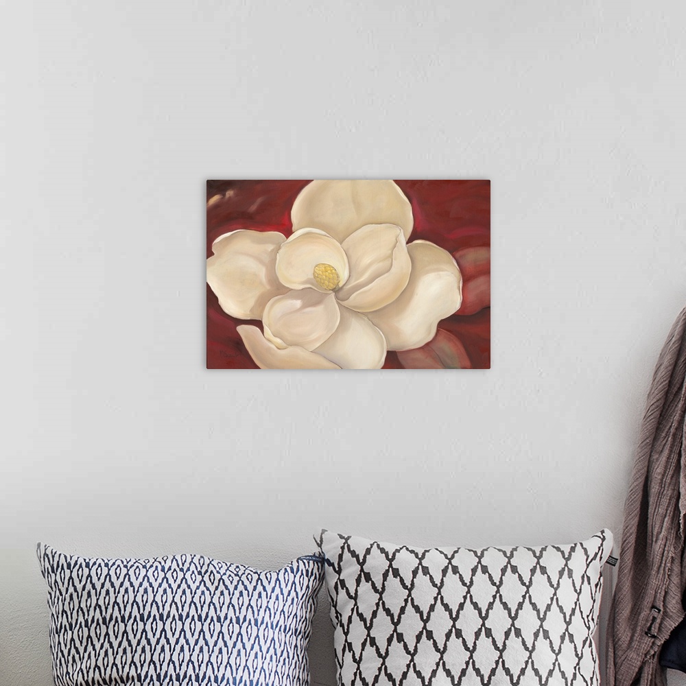 A bohemian room featuring Contemporary painting of a magnolia flower with broad petals.