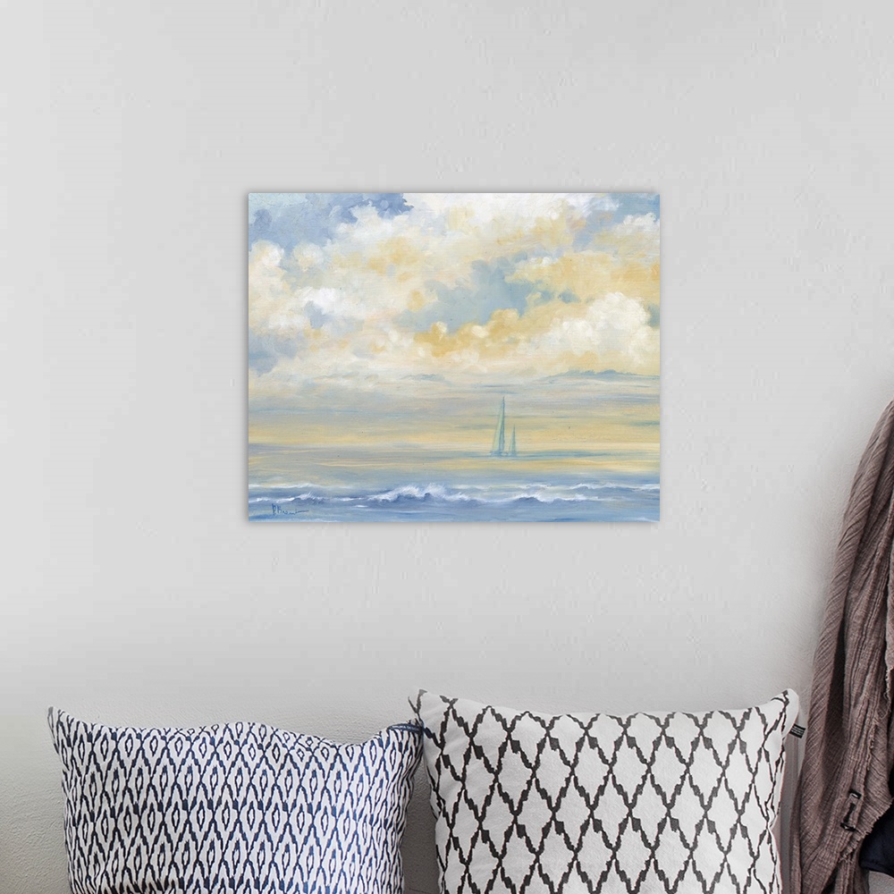 A bohemian room featuring Contemporary artwork of sailboats on the ocean in the distance under large clouds.