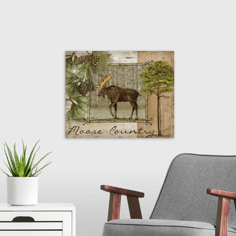 A modern room featuring Decorative artwork of a moose in a frame, with pine needles and pinecones, trees, and the words M...