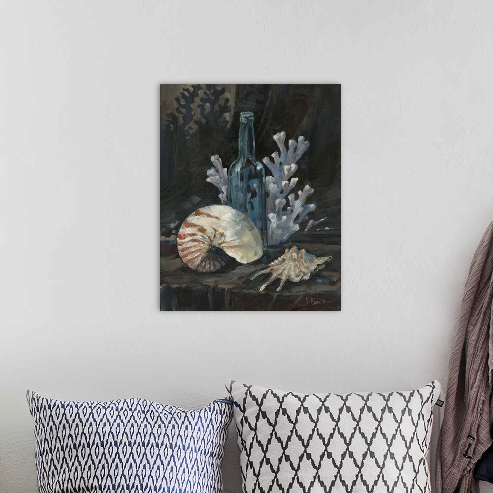 A bohemian room featuring Still life painting of a bottle, sea shells, and coral.