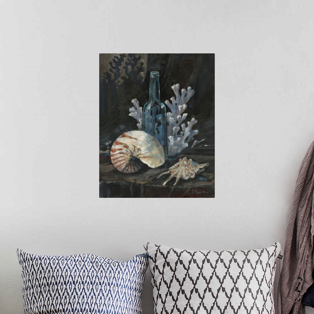 A bohemian room featuring Still life painting of a bottle, sea shells, and coral.